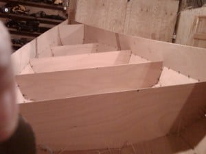 Canoe build project - All the planks stitched together