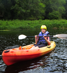 girl-riding-kayak-float-img