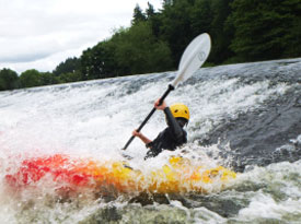 man-enjoy-surfing-with-boat